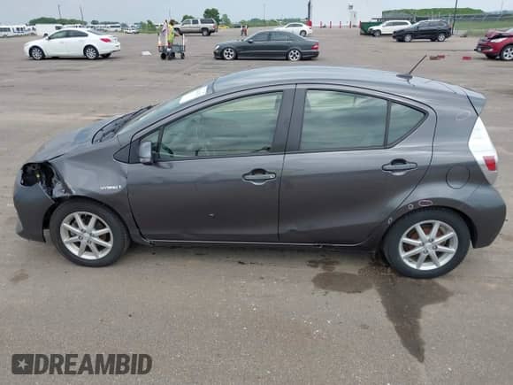 2014 Toyota Prius One with VIN JTDKDTB31E1570290, listed as a IAAI auction lot 42441474 with 164,068 mi miles and . Bid and sale history available at DreamBid. Image 15.