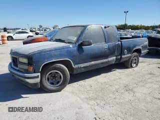 1998 GMC Sierra 1500 z VIN 1GTEC19M8WE556142, wystawiony jako Copart lot #74216184 z przebiegiem 306 795 mil mil oraz Czysty tytuł • Clean title. Historia ofert i sprzedaży dostępna na DreamBid. Obrazek 1.
