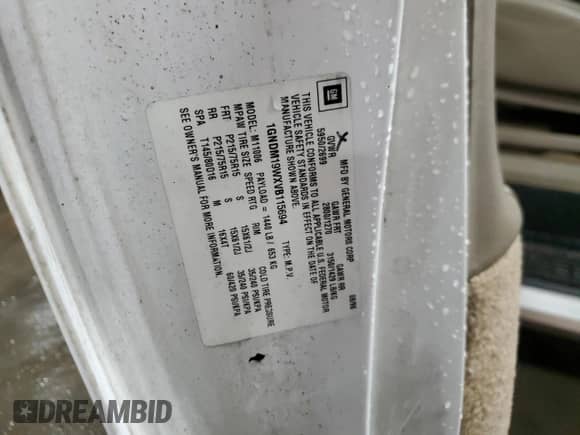 1997 Chevrolet Astro z VIN 1GNDM19WXVB115694, wystawiony jako Copart lot #86735154 z przebiegiem Nie podano mil oraz Szkoda całkowita • Salvage title. Historia ofert i sprzedaży dostępna na DreamBid. Obrazek 13.