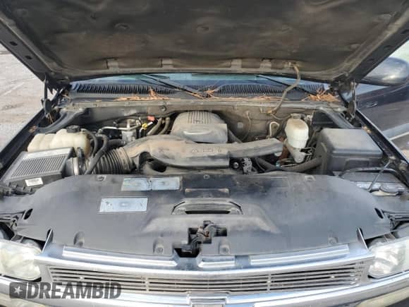 2004 Chevrolet Tahoe LT z VIN 1GNEK13ZX4J162922, wystawiony jako Copart lot #85115375 z przebiegiem 176 302 mil mil oraz Szkoda całkowita • Salvage title. Historia ofert i sprzedaży dostępna na DreamBid. Obrazek 12.