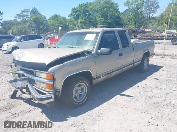 1999 Chevrolet Silverado 1500 with VIN 1GCEC19M5XR124635, listed as a IAAI auction lot 42053209 with 256,735 mi miles and . Bid and sale history available at DreamBid. Image 2.