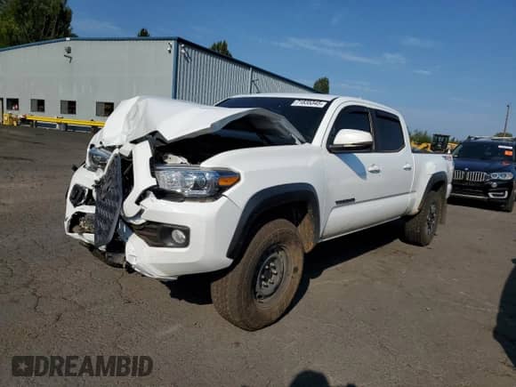 2022 Toyota Tacoma SR5 with VIN 3TMDZ5BN4NM130770, listed as a Copart auction lot 71835345 with 67,026 mi miles and Salvage title. Bid and sale history available at DreamBid. Image 1.