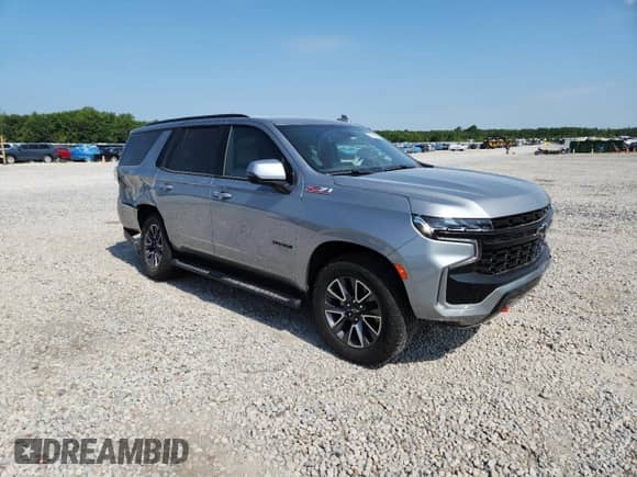 2023 Chevrolet Tahoe Z71 with VIN 1GNSKPKD0PR521471, listed as a Copart auction lot 65339615 with 57,973 mi miles and Salvage title. Bid and sale history available at DreamBid. Image 4.