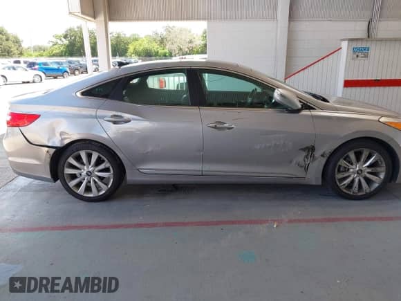 2013 Hyundai Azera с VIN KMHFH4JG7DA262096, выставлен на аукционе IAAI как лот 43018782 с пробегом 21 178 миль миль и . История ставок и продаж доступна на DreamBid. Изображение 6.