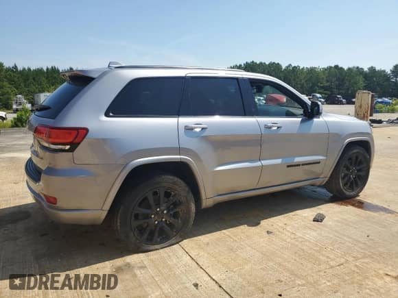 2020 Jeep Grand Cherokee Altitude z VIN 1C4RJEAGXLC391822, wystawiony jako Copart lot #61951045 z przebiegiem 54 686 mil mil oraz Szkoda całkowita • Salvage title. Historia ofert i sprzedaży dostępna na DreamBid. Obrazek 3.