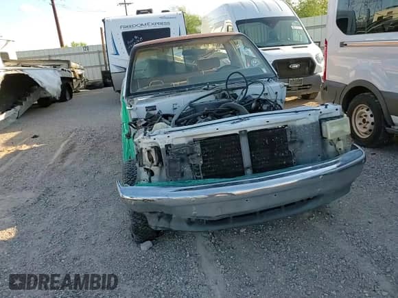 1992 Dodge Dakota S z VIN 1B7GL26X1NS529555, wystawiony jako Copart lot #65251054 z przebiegiem 220 482 mil mil oraz Szkoda całkowita • Salvage title. Historia ofert i sprzedaży dostępna na DreamBid. Obrazek 11.