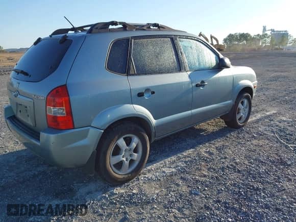 2006 Hyundai Tucson GL with VIN KM8JM12B26U250348, listed as a IAAI auction lot 43504432 with 223,846 mi miles and . Bid and sale history available at DreamBid. Image 4.