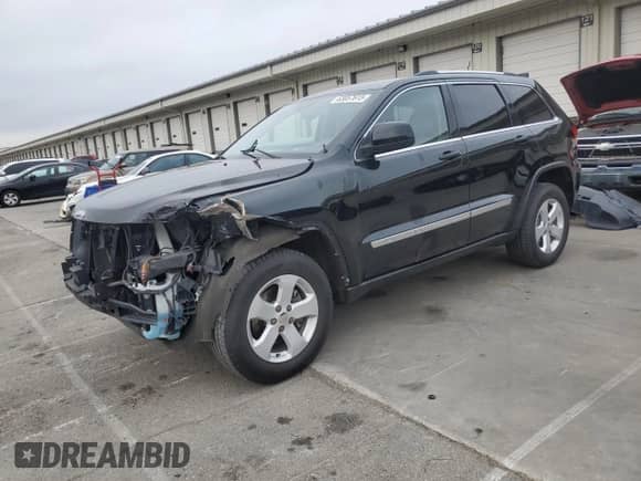 2012 Jeep Grand Cherokee Laredo с VIN 1C4RJEATXCC317054, выставлен на аукционе Copart как лот 63057615 с пробегом 159 633 миль миль и Списание • Salvage title. История ставок и продаж доступна на DreamBid. Изображение 1.