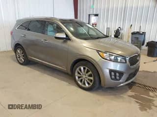 2016 Kia Sorento SXL z VIN 5XYPKDA57GG098233, wystawiony jako IAAI lot #41689174 z przebiegiem 127 347 mil mil oraz . Historia ofert i sprzedaży dostępna na DreamBid. Obrazek 1.