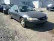 1998 Honda Accord EX with VIN 1HGCG1657WA030196, listed as a Copart auction lot 85301735 with 148,472 mi miles and Salvage title. Bid and sale history available at DreamBid. Image 13.