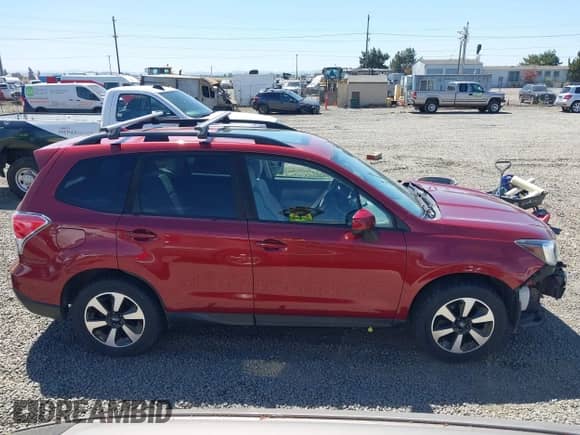 2018 Subaru Forester Premium z VIN JF2SJAGC0JH428568, wystawiony jako IAAI lot #42908934 z przebiegiem 147 546 mil mil oraz . Historia ofert i sprzedaży dostępna na DreamBid. Obrazek 14.