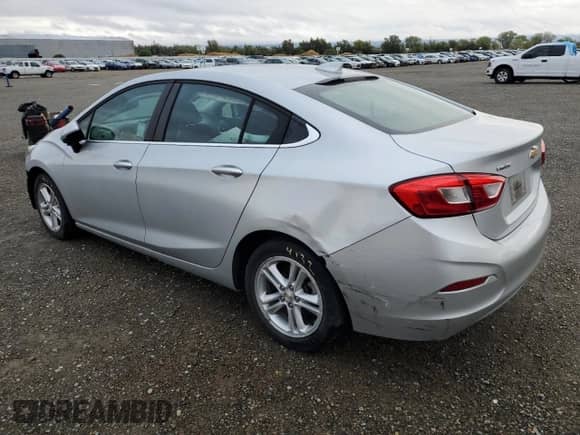 2018 Chevrolet Cruze LT с VIN 1G1BE5SM1J7242983, выставлен на аукционе Copart как лот 81910335 с пробегом 83 843 миль миль и Списание • Salvage title. История ставок и продаж доступна на DreamBid. Изображение 2.