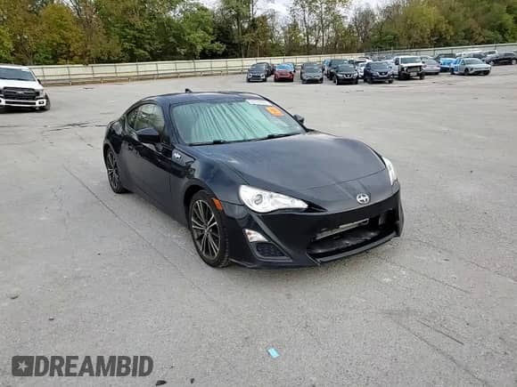 2016 Scion FR-S z VIN JF1ZNAA1XG9705809, wystawiony jako Copart lot #86789895 z przebiegiem 150 519 mil mil oraz Szkoda całkowita • Salvage title. Historia ofert i sprzedaży dostępna na DreamBid. Obrazek 13.