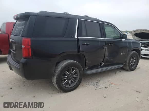 2018 Chevrolet Tahoe LT with VIN 1GNSCBKC1JR184534, listed as a Copart auction lot 87215635 with 145,300 mi miles and Salvage title. Bid and sale history available at DreamBid. Image 3.