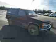 1997 Chevrolet Tahoe z VIN 3GNEK18R0VG177229, wystawiony jako Copart lot #86872144 z przebiegiem 62 707 mil mil oraz Szkoda całkowita • Salvage title. Historia ofert i sprzedaży dostępna na DreamBid. Obrazek 4.