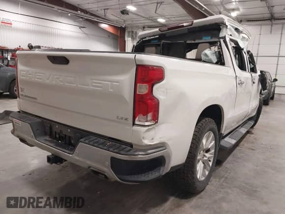 2021 Chevrolet Silverado 1500 LTZ with VIN 3GCUYGEL5MG270204, listed as a IAAI auction lot 42372926 with 66,832 mi miles and . Bid and sale history available at DreamBid. Image 4.