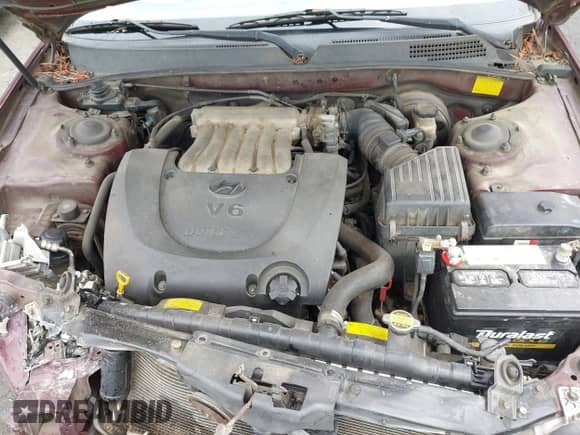 2002 Hyundai Sonata GLS z VIN KMHWF35H02A557637, wystawiony jako IAAI lot #42371189 z przebiegiem 290 234 mil mil oraz . Historia ofert i sprzedaży dostępna na DreamBid. Obrazek 10.