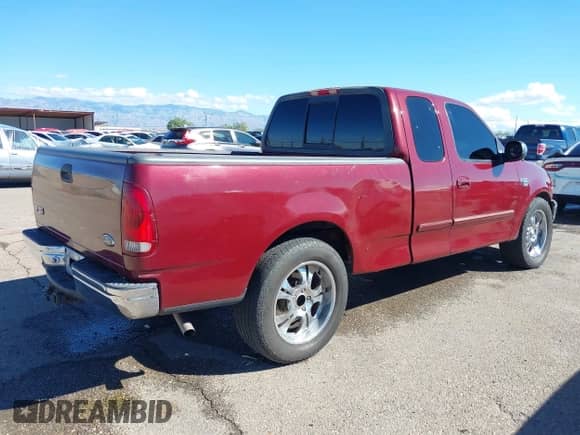 1999 Ford F-150 with VIN 1FTRX17W3XKB03527, listed as a IAAI auction lot 43450405 with 121,752 mi miles and . Bid and sale history available at DreamBid. Image 4.