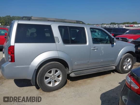 2011 Nissan Pathfinder LE with VIN 5N1AR1NN5BC621395, listed as a IAAI auction lot 43201658 with 96,736 mi miles and . Bid and sale history available at DreamBid. Image 13.