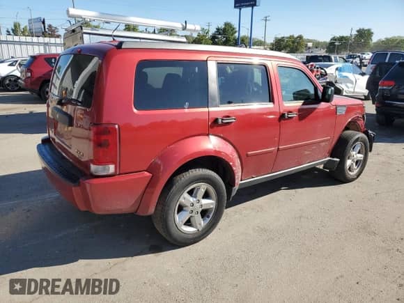 2007 Dodge Nitro SXT with VIN 1D8GU28K77W662820, listed as a Copart auction lot 83799305 with 175,658 mi miles and Salvage title. Bid and sale history available at DreamBid. Image 3.