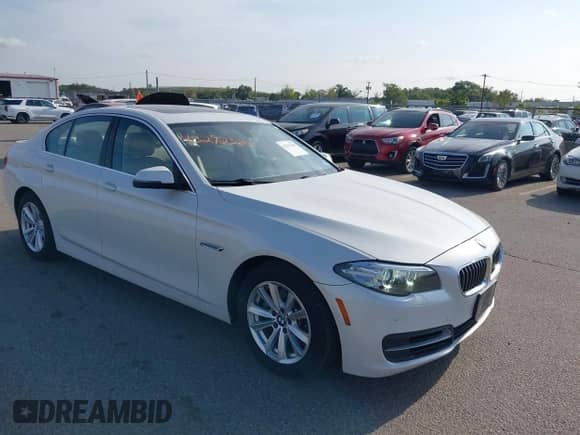 2014 BMW 5 Series 528i xDrive with VIN WBA5A7C57ED616617, listed as a IAAI auction lot 43292380 with 77,128 mi miles and . Bid and sale history available at DreamBid. Image 1.