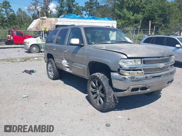 2003 Chevrolet Tahoe LS with VIN 1GNEC13Z93R101977, listed as a IAAI auction lot 43299440 with 173,016 mi miles and . Bid and sale history available at DreamBid. Image 1.