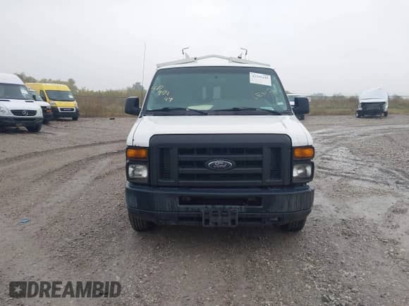 2013 Ford Econoline Cargo Commercial with VIN 1FTNE1EW8DDA38309, listed as a IAAI auction lot 43395449 with 252,665 mi miles and . Bid and sale history available at DreamBid. Image 12.
