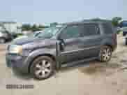 2015 Honda Pilot Touring с VIN 5FNYF3H96FB011875, выставлен на аукционе Copart как лот 59057085 с пробегом 165 328 миль миль и Списание • Salvage title. История ставок и продаж доступна на DreamBid. Изображение 1.