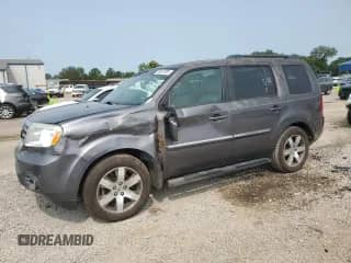 2015 Honda Pilot Touring с VIN 5FNYF3H96FB011875, выставлен на аукционе Copart как лот 59057085 с пробегом 165 328 миль миль и Списание • Salvage title. История ставок и продаж доступна на DreamBid. Изображение 1.