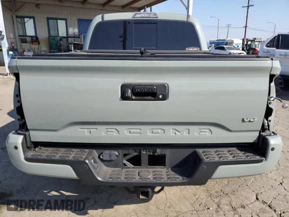 2022 Toyota Tacoma TRD Off Road с VIN 3TMCZ5AN6NM494685, выставлен на аукционе Copart как лот 82319385 с пробегом 42 267 миль миль и Списание • Salvage title. История ставок и продаж доступна на DreamBid. Изображение 6.