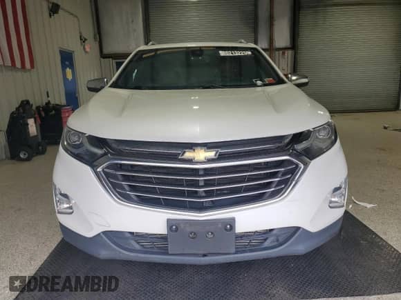 2018 Chevrolet Equinox Premier z VIN 2GNAXVEV6J6164385, wystawiony jako Copart lot #80213225 z przebiegiem 82 081 mil mil oraz Czysty tytuł • Clean title. Historia ofert i sprzedaży dostępna na DreamBid. Obrazek 5.