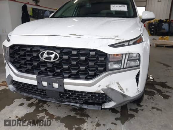 2021 Hyundai Santa Fe SE with VIN 5NMS1DAJ2MH352913, listed as a IAAI auction lot 43548098 with 93,758 mi miles and . Bid and sale history available at DreamBid. Image 6.