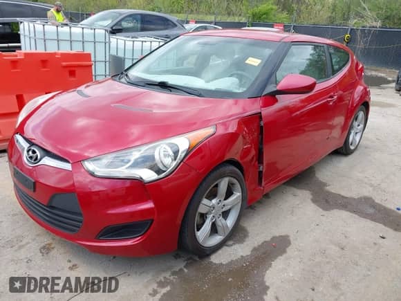 2013 Hyundai Veloster w/Black Int z VIN KMHTC6AD1DU123454, wystawiony jako IAAI lot #42049880 z przebiegiem 62 436 mil mil oraz . Historia ofert i sprzedaży dostępna na DreamBid. Obrazek 21.