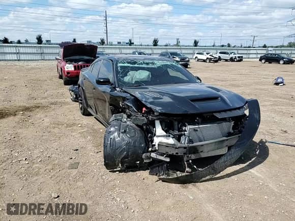 2023 Dodge Charger SRT Hellcat Redeye Widebody with VIN 2C3CDXL92PH520716, listed as a Copart auction lot 71207485 with 7,869 mi miles and Salvage title. Bid and sale history available at DreamBid. Image 14.