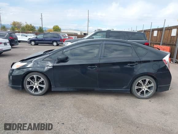 2012 Toyota Prius Four with VIN JTDKN3DU2C1561825, listed as a IAAI auction lot 43545693 with 94,090 mi miles and . Bid and sale history available at DreamBid. Image 14.