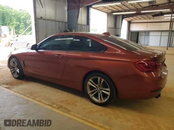 2018 BMW 4 Series 430i xDrive with VIN WBA4W5C56JAA49932, listed as a Copart auction lot 55256205 with 104,752 mi miles and Clean title. Bid and sale history available at DreamBid. Image 2.