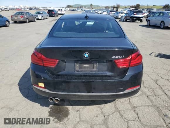 2018 BMW 4 Series 430i with VIN WBA4W3C57JAE64861, listed as a Copart auction lot 49739115 with 115,188 mi miles and Salvage title. Bid and sale history available at DreamBid. Image 6.