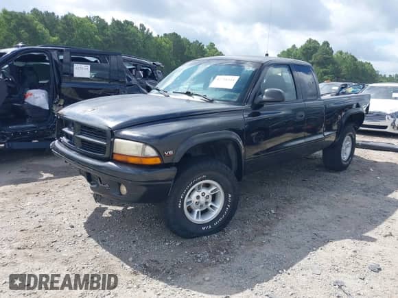 1998 Dodge Dakota with VIN 1B7GG22X6WS714048, listed as a IAAI auction lot 42728244 with 185,255 mi miles and . Bid and sale history available at DreamBid. Image 2.