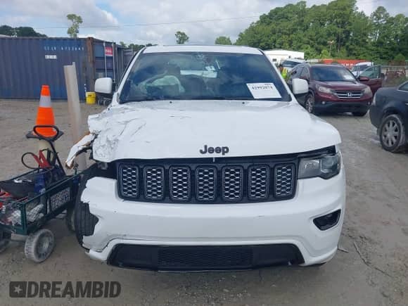 2019 Jeep Grand Cherokee Altitude with VIN 1C4RJEAG3KC597689, listed as a IAAI auction lot 42992074 with 99,763 mi miles and . Bid and sale history available at DreamBid. Image 11.