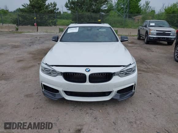 2014 BMW 4 Series 435i xDrive z VIN WBA3R5C56EK187339, wystawiony jako IAAI lot #42499380 z przebiegiem 126 895 mil mil oraz . Historia ofert i sprzedaży dostępna na DreamBid. Obrazek 12.