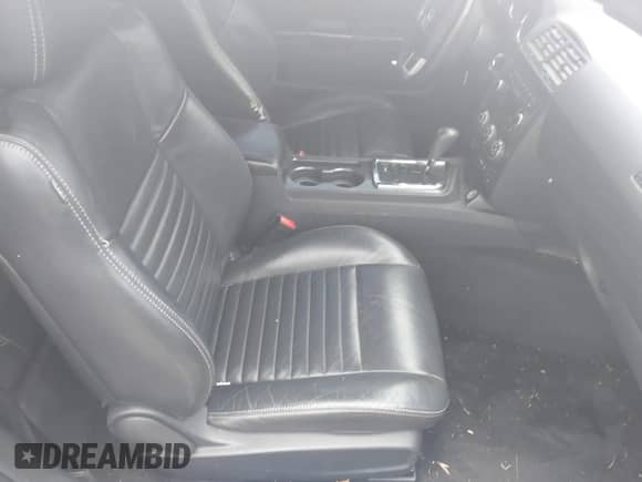2013 Dodge Challenger SXT with VIN 2C3CDYAG0DH570095, listed as a IAAI auction lot 42282130 with 191,728 mi miles and . Bid and sale history available at DreamBid. Image 5.