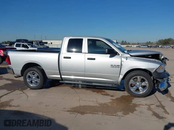 2013 Ram 1500 Tradesman z VIN 1C6RR6FP6DS530057, wystawiony jako IAAI lot #41763335 z przebiegiem 144 125 mil mil oraz . Historia ofert i sprzedaży dostępna na DreamBid. Obrazek 13.
