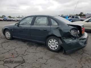 2001 Saturn LS с VIN 1G8JU54F41Y581083, выставлен на аукционе Copart как лот 73123714 с пробегом 98 500 миль миль и Списание • Salvage title. История ставок и продаж доступна на DreamBid. Изображение 2.
