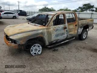 2003 Dodge Dakota Sport with VIN 1D7HG38N53S127292, listed as a Copart auction lot 62985315 with Not provided miles and Salvage title. Bid and sale history available at DreamBid. Image 1.