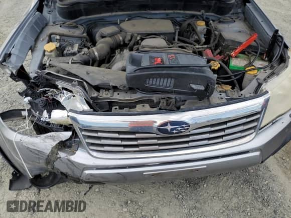 2009 Subaru Forester X with VIN JF2SH63609H757954, listed as a Copart auction lot 81687685 with 171,573 mi miles and Salvage title. Bid and sale history available at DreamBid. Image 12.