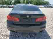 2020 BMW 5 Series M550i xDrive with VIN WBAJS7C08LCD86916, listed as a Copart auction lot 61663155 with 58,657 mi miles and Salvage title. Bid and sale history available at DreamBid. Image 6.