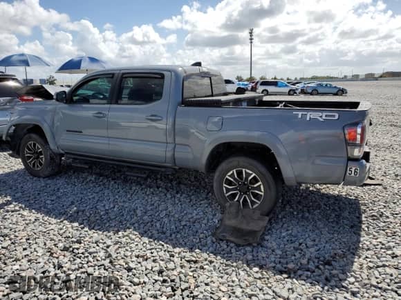 2021 Toyota Tacoma SR5 z VIN 3TMDZ5BN8MM101433, wystawiony jako Copart lot #85155445 z przebiegiem 101 974 mil mil oraz Nie do naprawy • Non repairable. Historia ofert i sprzedaży dostępna na DreamBid. Obrazek 2.