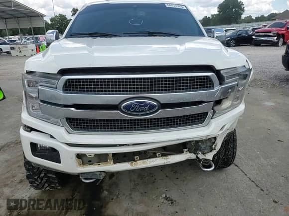 2020 Ford F-150 XL with VIN 1FTEW1E55LFA60517, listed as a Copart auction lot 68031525 with 148,577 mi miles and Salvage title. Bid and sale history available at DreamBid. Image 13.