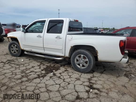 2011 Chevrolet Colorado 1LT z VIN 1GCHTCFE6B8121313, wystawiony jako Copart lot #58437305 z przebiegiem 146 294 mil mil oraz Czysty tytuł • Clean title. Historia ofert i sprzedaży dostępna na DreamBid. Obrazek 2.