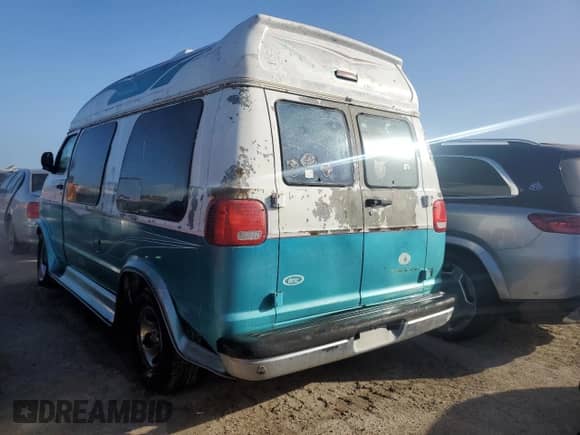 1999 Dodge Cargo Conversion with VIN 2B6HB11Y5XK521588, listed as a Copart auction lot 75468904 with Not provided miles and Non repairable. Bid and sale history available at DreamBid. Image 2.